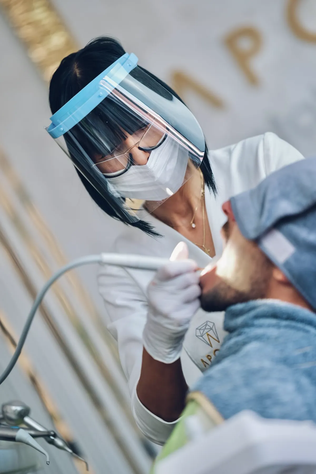 Dr Ana Tešić working on a patient at Aponia Dental Center
